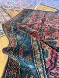 Antique Malayer runner rug with punchy berry pink tones and durable wool construction.