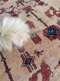Traditional Persian Mahal palace rug laying flat to show scale, color rhythm, and low pile wool.