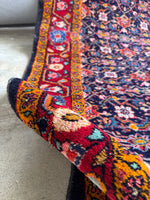 Vintage Persian scatter rug handwoven with soft, healthy wool.