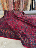 Luxurious Persian rug made with vegetable-dyed wool.