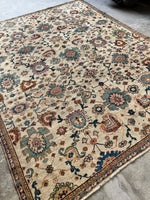 Beautiful floral rug with preserved antique condition.