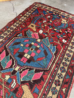 Persian rug featuring a striking French blue center medallion.