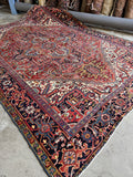9x12 antique Persian Heriz rug, red and blue geometric medallion rug from the 1920s with vegetable-dyed wool.