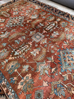 Handwoven Persian rug with autumn-inspired color palette