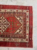 One end view of an antique Persian Serab hallway runner.