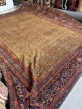 Large antique rug with vegetable dyed wool, floppy handle, and a low pile.