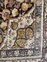 Soft pink accents and ivory details giving the Tabriz a delicate look.