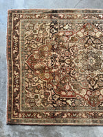 Espresso outlines adding contrast to the medallion and floral motifs.