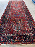 Hand knotted Persian Heriz rug. Long antique gallery rug with bold stepped medallions, geometric motifs, and a durable Northwest Persian weave.
