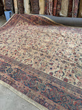 Hand knotted Persian Mahal rug. Antique ivory wool carpet with a richly detailed rust border and naturally aged vegetable dyes.