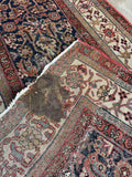 Underside view of authentic antique Persian Malayer runner for hallway or kitchen with rich vegetable dyed colors.