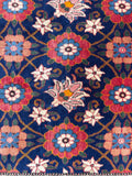 Mina Khani Persian rug detail displaying intricate interlinked geometric flower lattice.