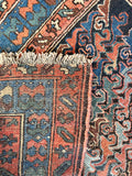 Underside of antique Persian scatter rug.