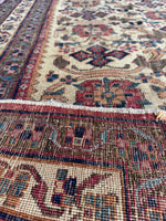 Underside view of Persian Afshar rug showing patina, character, and vibrant patterning.