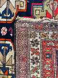 Detailed view of vegetable-dyed wool texture and underside.