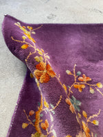 Handwoven small Chinese rug made with vegetable dyed wool.