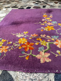 Close up view of secured edge and floral details.