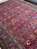 Tehran rug field with blooming botanical elements
