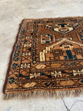 Vintage Turkmen tribal bag rug displayed flat on concrete, showing a 1'5 x 4'5 narrow runner format.