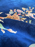 Heavy-duty, weighted Chinese Art Deco rug with sheen and durability.