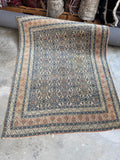 High traffic vintage wool rug full photo showing overall rectangle proportion measuring 4'2 x 5'6.