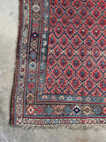 Corner view of dense wool Bidjar rug built for heavy foot traffic.
