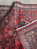 Close up of dense wool weave on back of the Bidjar rug.