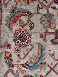 Historic hand-knotted Persian runner combining a water garden motif with aged terracotta tones.
