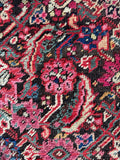 Bright and bold antique rug with classic Herati design