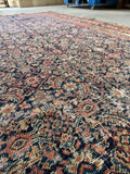 Antique Persian wool rug. Vintage Ferahan carpet with an allover Fish design, shabby chic patina, and rich antique colors.