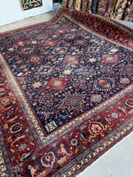 Overhead shot of Heriz rug showing full layout and rich color palette.