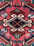 Antique Heriz rug center medallion angular design.