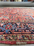 Antique Heriz rug midnight blue turtle border detail.