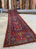 Antique Persian Heriz runner full view.