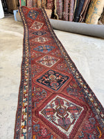 Handwoven vegetable dyed wool brings natural color palette to long 18 foot runner rug.