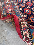 Thick pile Persian rug shot showing dense wool texture and mint condition weave.