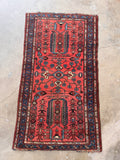 Colorful vintage accent rug woven in Persia during the 1920s with organic nature motifs.