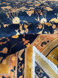 Texture detail showing dense wool and soft finish in antique Indian rug.