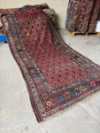 Tribal fortress style Persian Bidjar rug with bold latticework.