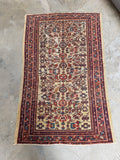 Handwoven Persian rug made from vegetable dyed wool.