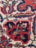 Vegetable dyed wool Heriz rug  highlighting natural color variations and hand-knotted pile structure.