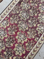 Diagonal close-up of Karabagh runner showing intricate design and abrash blend.