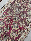 Diagonal close-up of Karabagh runner showing intricate design and abrash blend.