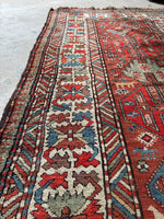 Shabby chic antique Kazak runner with naturally aged vegetable dyes and a contrasting ivory border band.