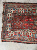 Kazak runner outer fence band motif for security.