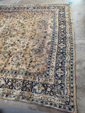 Antique Persian Kerman rug that was handmade with vegetable dyed wool.
