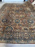 Antique Kerman rug field with large scale motifs and fine weave.
