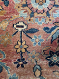 vintage Persian rug with rich blue tones and soft field.