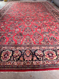 Large antique Persian carpet with a heavy, thick pile and classic vegetable-dyed wool construction.