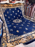 Oversized blue Peking antique rug full shot highlighting the expansive blue field and natural color shifts.